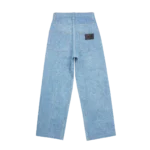 Washed streetwear denim jeans side fit — relaxed pleated silhouette with blanket wash finish on model