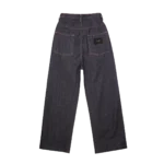 Raw denim streetwear jeans side fit — pleated silhouette with relaxed hip and tapered leg on model