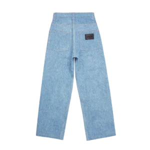 Washed streetwear denim jeans side fit — relaxed pleated silhouette with blanket wash finish on model