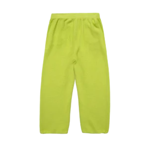 Lime streetwear joggers styled with oversized hoodie and sneakers